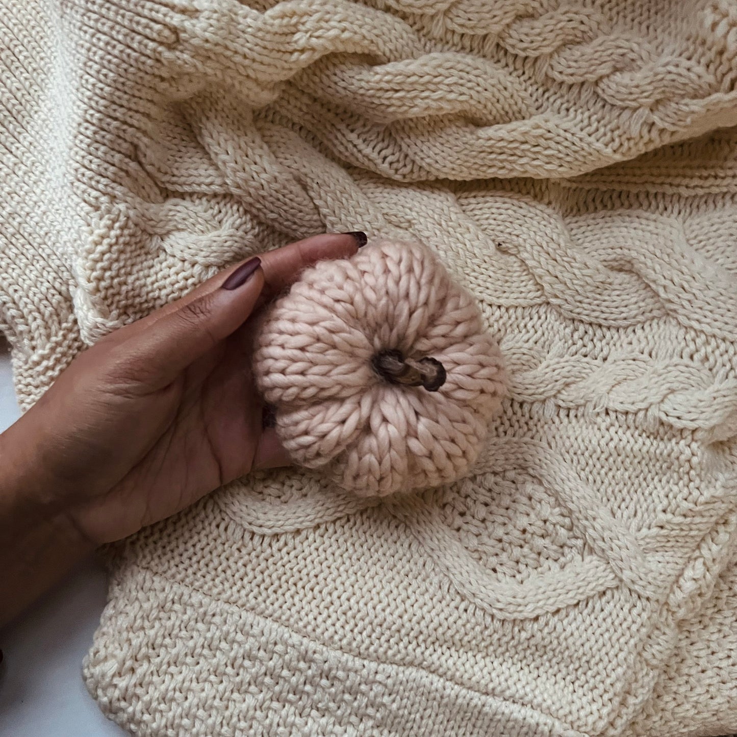 Tiny knitted pumpkin blush