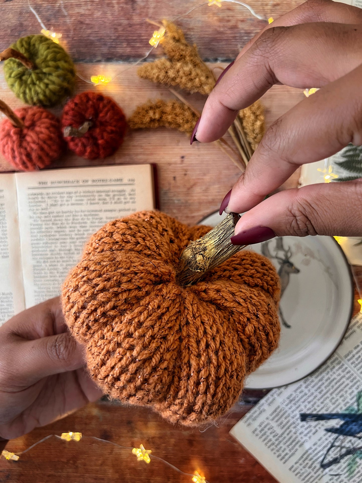 Tiny knitted pumpkin glitter orange with gold stalk