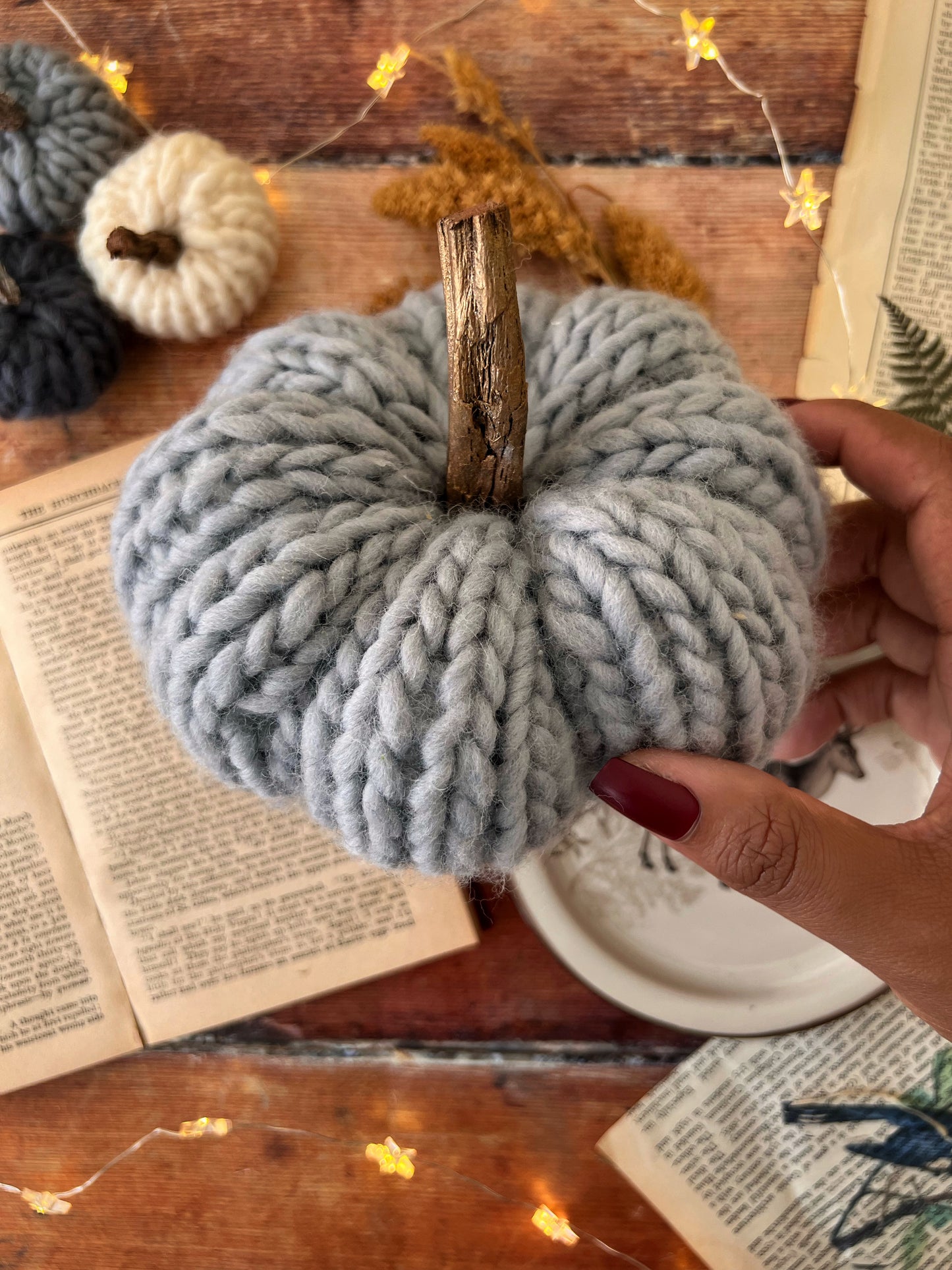 Small knitted pumpkin grey with rose gold stalk