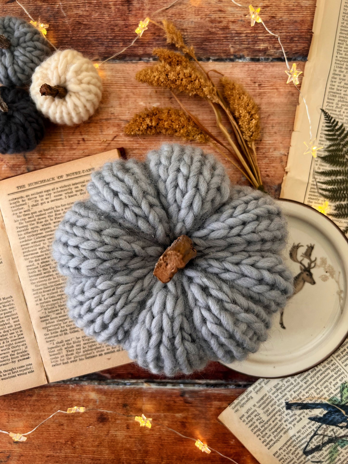 Small knitted pumpkin grey with rose gold stalk