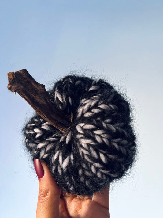 Tiny black and grey mohair knitted pumpkin